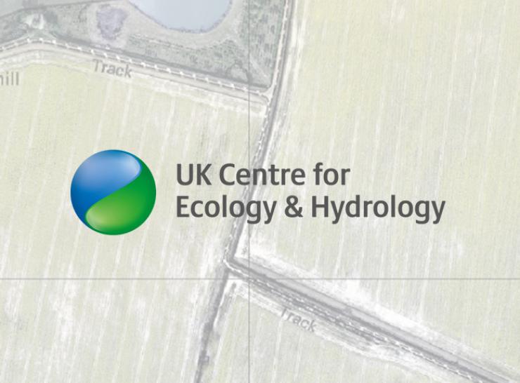 Aerial view of fields overlaid with UKCEH logo