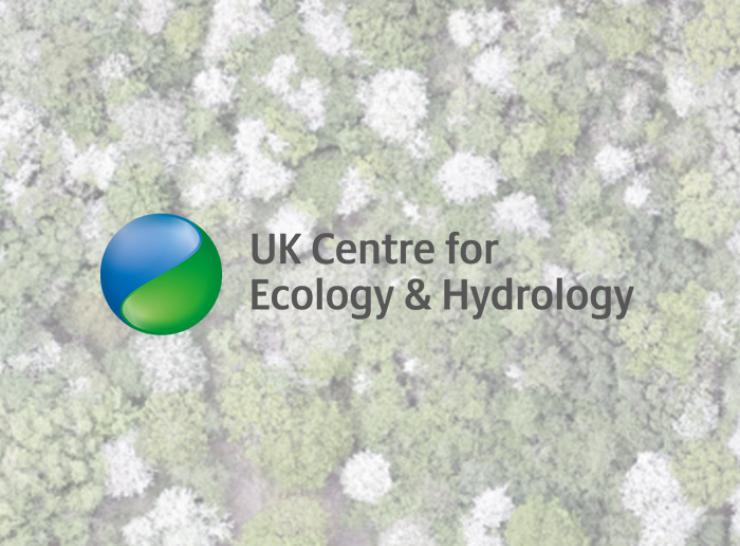 Aerial view of Monks Wood overlaid with UKCEH logo