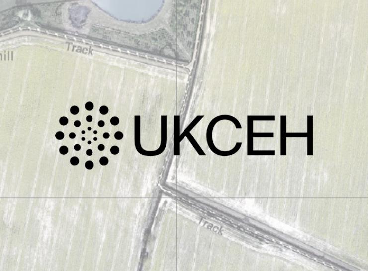 Aerial view of Hillesden site overlaid with the UKCEH logo 