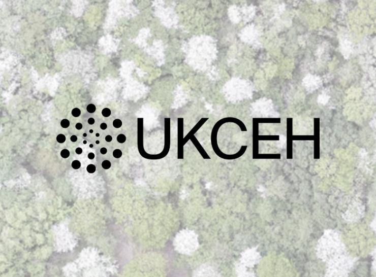 Aerial view of Monks Wood overlaid with the UKCEH logo 